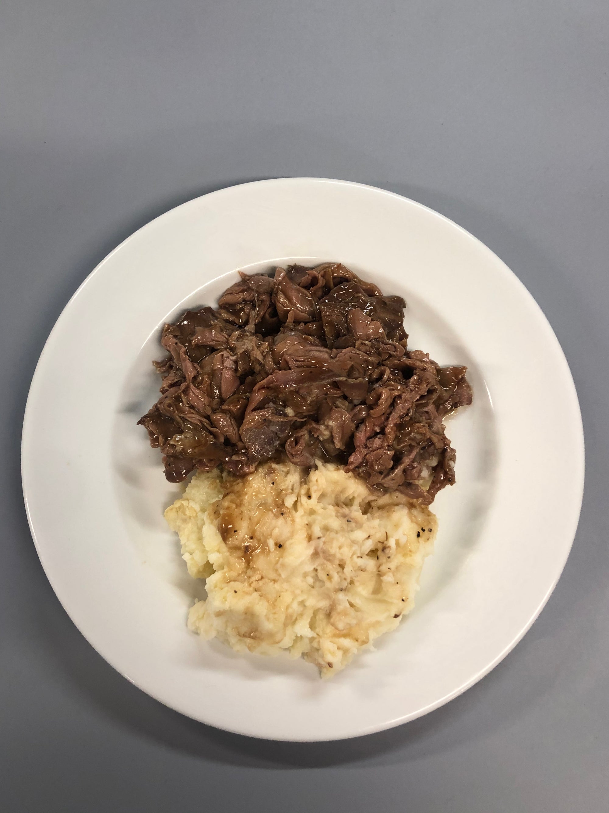 Pot Roast over Mashed Potatoes